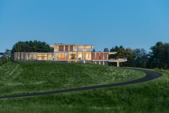 Walker Road modern house exterior with multi level windows and terraces
