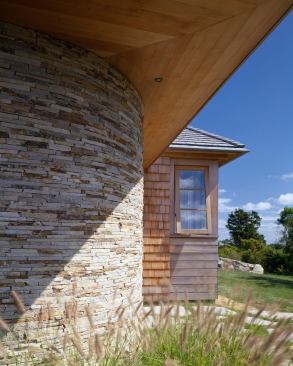 The stone "sugar mill" is a marker for the entry, and a powder room on the interior.