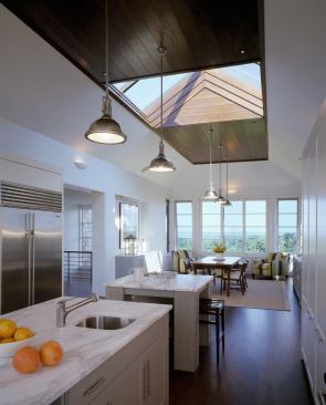 A ridge skylight scoops light into the kitchen.