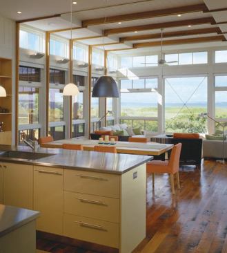 The kitchen great room opens on three sides to a view of Vineyard Sound.