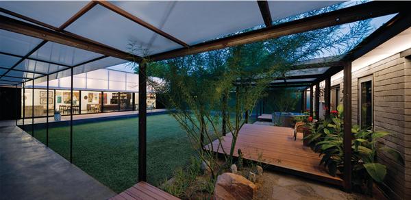 A new courtyard provides outdoor living space, while covered walkways offer shade from the Arizona sun.