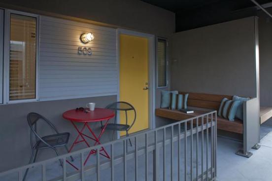 The units feature semi-private outdoor spaces.