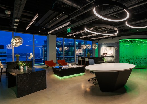 Upon arrival at the Customer Experience Center the seating area is illuminated in the lounge lighting scene but once a nearby iPad is lifted an Augmented Reality experience begins and the lighting scene changes to provide diffused light.