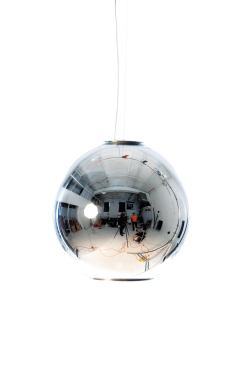 Designed by Roberto Menghi in 1968, FontanaArte’s Globo di Luce features a blown-glass globe with metallic finish and an anodized-aluminum internal reflector. Suspended on a transparent cord a maximum of 98.4" below a chrome-plated metal ceiling canopy, the 11.8"-wide-by-11.4"-tall pendant uses a 75W T4 G9 halogen lamp; a 17.7"-wide-by-16.9"-tall version is also available. Globo di Luce comes in red, silver, or gold. • 
fontanaarte.it