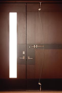 The spring’s shape echoes the curvature of a hallway inside.