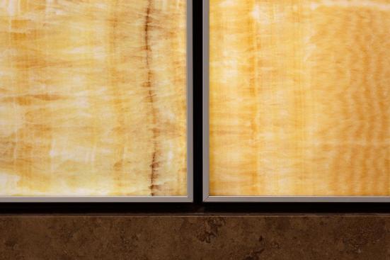 LightPlane Panels in ViviStone Honey Onyx with Pearlex finish shown illuminated at the Woolworth Building, Eugene, Oregon