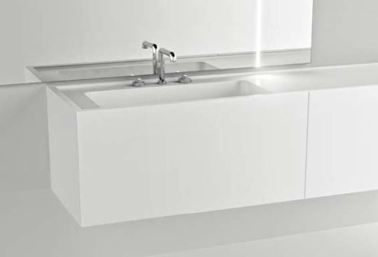 The b20 modular and b21 mono-block vanities feature pull-out drawers and an integrated washbasin, both in a white matte finish.