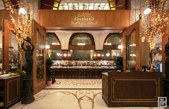THE ARCADE/
The architecture of the arcade is revitalized into an inviting hidden gem of ornament and spectacle between two existing buildings. A once overlooked pedestrian walkway is reactivated to the public and transformed into a moment of discovery. The arcade synchronously serves as a transition point between the two city streets and the Art Nouveau revival of the restaurant; a mere introduction to the interior space awaiting one’s entry. The floor has been hand-crafted in half inch mosaic Carrara Marble tiles following custom organic patterns. A palette of neutral colors blend with the existing brick flooring and glass wall surroundings. As this space was intended for outdoor use in dining, year-round functionality is also addressed by integrating a heated floor system below the mosaic tiling.