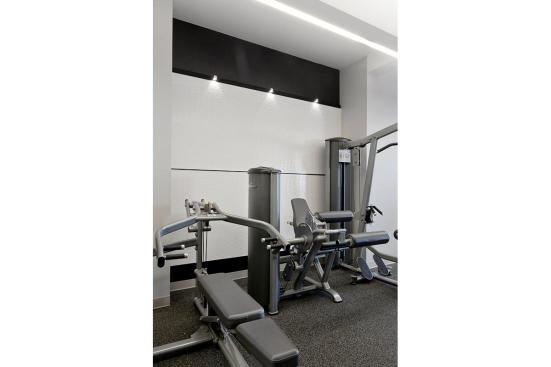 LEVELe Wall System with Capture panels; insets in Bonded Quartz, White with Waterfall pattern at Gracie Mews Pool & Health Club, New York, New York