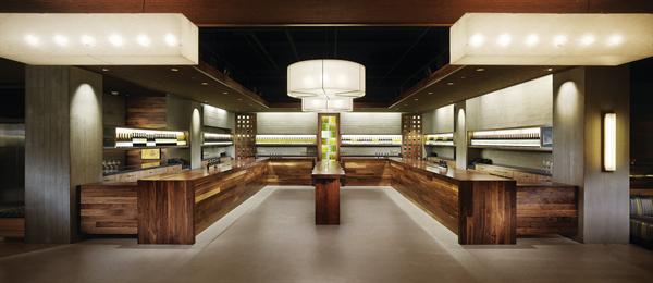 A new take on the wine bar, Press Club--in the base of the Four Seasons Hotel in San Francisco--plays host to eight local wineries at different stations on the two main horseshoe bars (one of which can be seen above) in an industry-meets-nature-inspired setting.