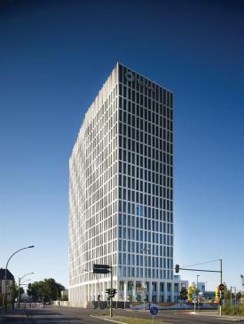 The+building+is+clad+in+a+load-bearing+skin+of+concrete+columns+and+beams%2c+which+were+fabricated+by+Dre%c3%9fler+Bau.