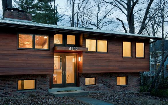 After: New clad wood windows, metal roofing, and mahogany siding bring the 1960s era exterior into the 21st Century and nicely matches the new interior upgrades.