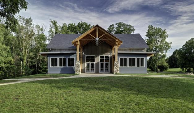 The+727-square-foot+front+addition+on+the+upper+level+of+the+Timber-Frame+Barn+includes+a+new+porch+pavilion+and+a+camper+welcome+center%2c+which+span+the+length+of+the+old+barn.