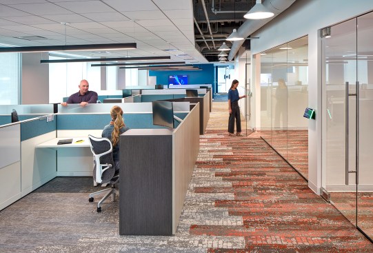Heads down workspaces are near private conference and collaboration rooms for easy access.