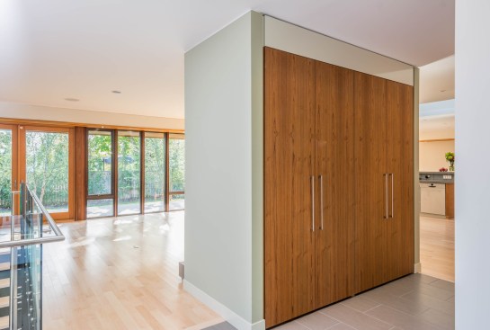 Entry closet provides space definition