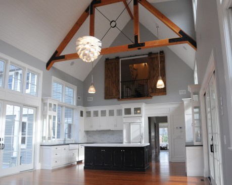 View from Family Room to Kitchen and second floor overlook.