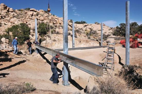 Because it connects to structural concrete footings, it is minimally invasive to the landscape.