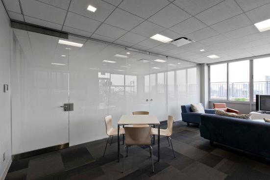 Partition wall and doors in ViviGraphix Gradiance glass with Scatter interlayer and Standard finish at Gracie Mews Pool & Health Club, New York, New York