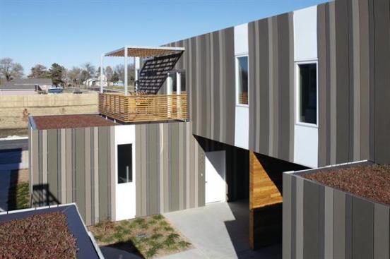 Planted roofs and balconies grace the units' upper levels.