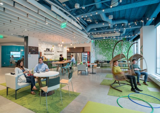 This “Hive,” designed in a block party theme, utilizes cateryary mount festoon lamps and LED filament lamps mounted at various heights. 