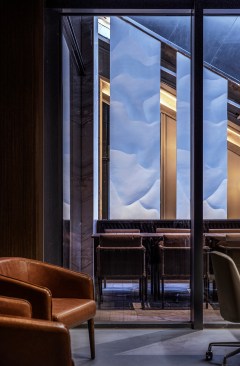 An office room with a view of the “waterfall”