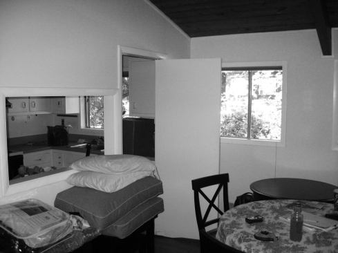 Before: The original kitchen was closed off from the dining room.