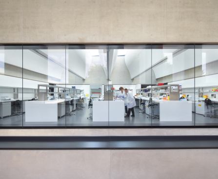 The building is shaped like an "L" to offer scientests views of the outside while working within the sterile laboratory setting.