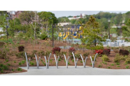 Bike Garden Bike Racks shown in cast-in-place configuration with Aluminum Texture powdercoat at Historic Fourth Ward Park, Atlanta, Georgia