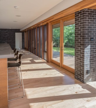 Light illuminates the space from windows as well as overhead skylights