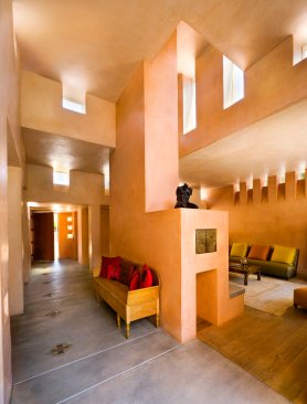 Mandeville Canyon modern home entry hall interior with clerestory portal window and skylights