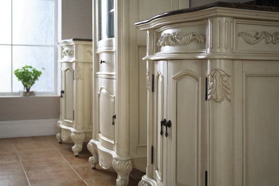 An antique replica, the vanity features hand-carved pilasters and legs.