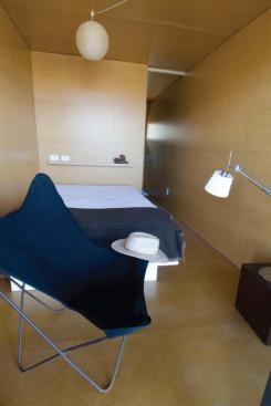 A rear window and swing-open double doors invite cross-ventilation through the MDF-wrapped interiors.
