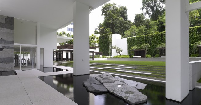 Thoughtful landscaping connects the building with the surroundings.