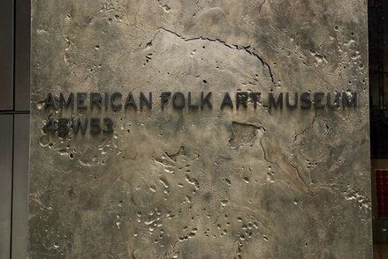 White bronze panels, cast in an art foundry, make up the Folk Art Museum's façade.
