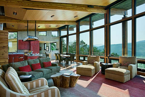 Interior, horizontal, living room toward kitchen and dining areas, Landes-Oatey residence, Jackson, Wyoming; Ward + Blake Architects