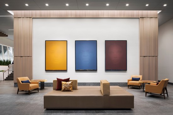 Three carefully balanced layers of lighting, including grazing, wall-washing and 10-degree spots illuminate art work.