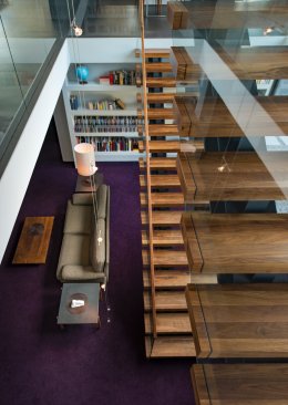 Walker Road modern home stairway through three story open central volume