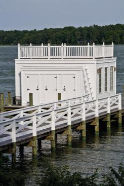 Muse Architects refurbished the dilapidated dock house. Used as a sitting room on the pier, its also an evocative view from the house. 