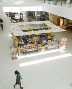 Ceiling panels protect from balcony hazards while satisfying fire codes.
