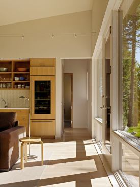 Built-in cabinetry, doors, and windows all meet an 8-foot-high datum throughout the house, providing a sense of consistency and order.