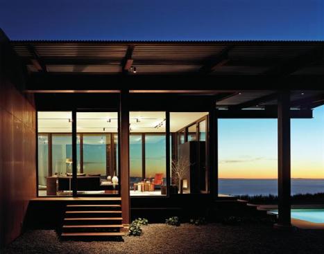 The living area connects to a garden and swimming pool. 