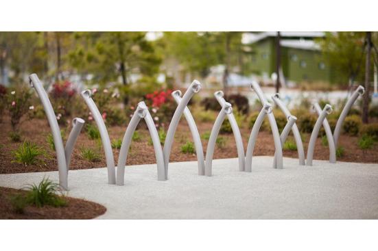 Bike Garden Bike Racks shown in cast-in-place configuration with Aluminum Texture powdercoat at Historic Fourth Ward Park, Atlanta, Georgia