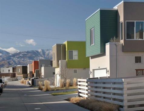 The alley-loaded homes hide cars and reinforce walking.