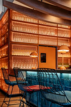 The restaurant's Pisco Bar, the area’s first, is ordained with orange metal mesh paneling that showcases a variety of Pisco infusions including indigenous fresh herbs, fruits and unique spices. 