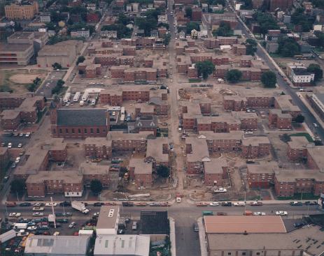 An+aerial+view+showing+the+complex+as+it+stood+before+renovations%2c+with+the+remains+of+the+1948+public+housing+development.