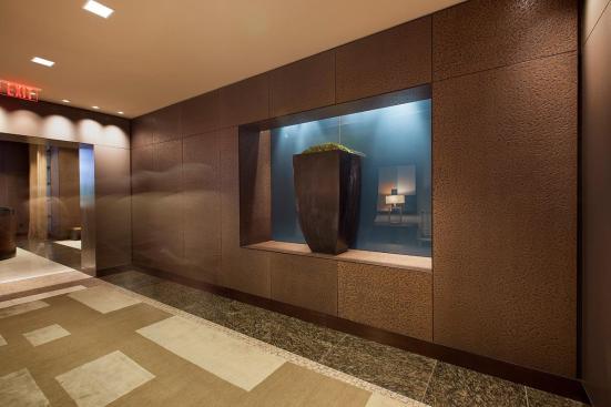 Walls shown in Bonded Bronze with Dark Patina and custom pattern at Residences at the InterContinental, Boston, Massachusetts