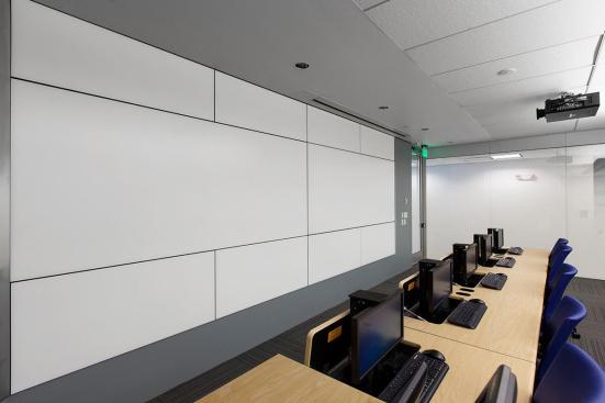 LEVELe Wall System with Blind panels; insets in ViviChrome Scribe glass with White interlayer and Pearlex finish; Stainless Steel with Linen finish at Florida International University - Ryder School of Business, Media Labs, Miami, Florida