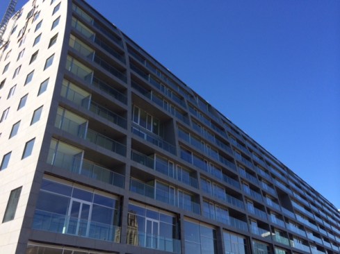 Apartments+rise+up+twelve+stories+above+the+stalls+of+the+Market+Hall.