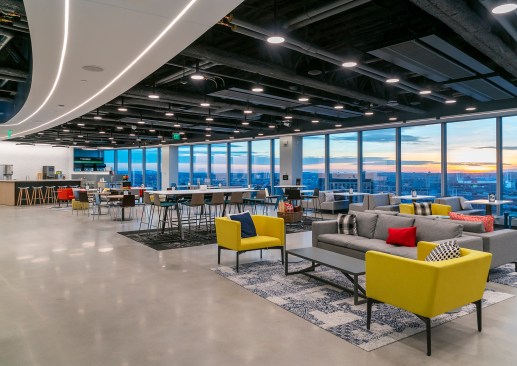 The 17th floor café provides breathtaking city views and features the gigantic curvilinear light wrapping around the entire floor. 
