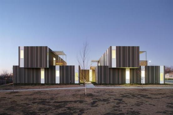 Fiber-cement board creates a rainscreen cladding. Its colors vary, so over time old boards can be switched out with no noticeable difference.